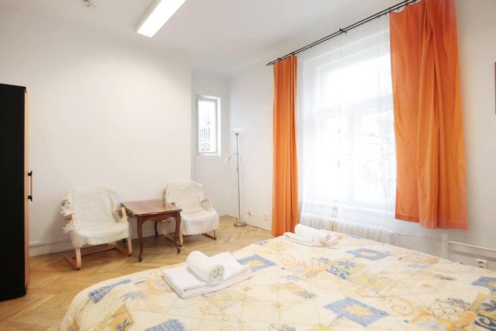 Room #1: double-bed, chairs, wardrobe, table