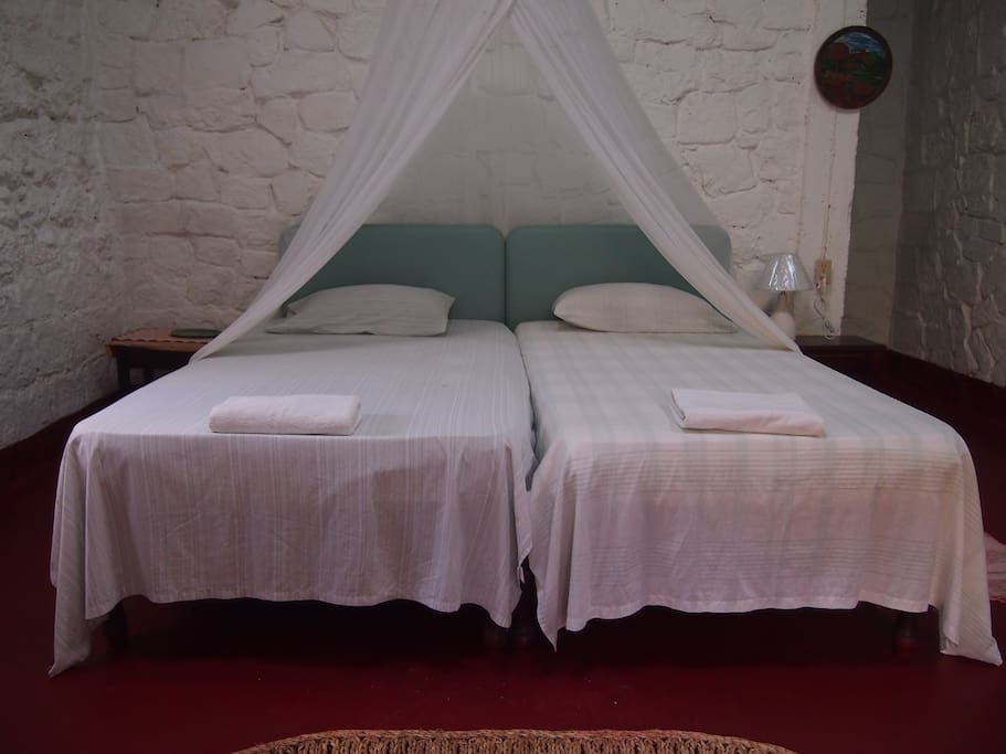 2-Twin beds located inside the double room.
