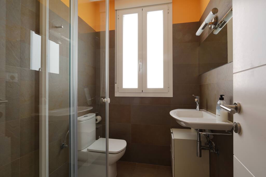 BAÑO naranja