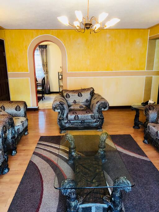 Living area with Royal 7 seater, Flat screen TV, Home theatre, DVD player, WiFi - relax and lounge with the family