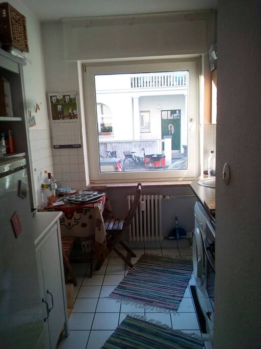 fully equipped kitchen with a washing machine that you can use