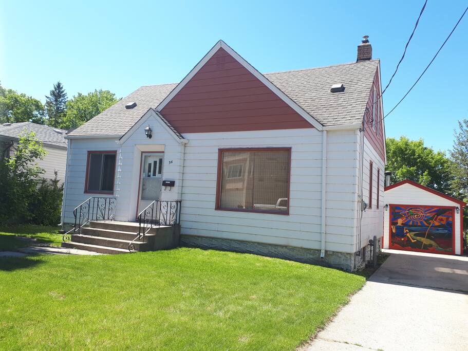 House and Cabin from the front street, the Green Room at the left.