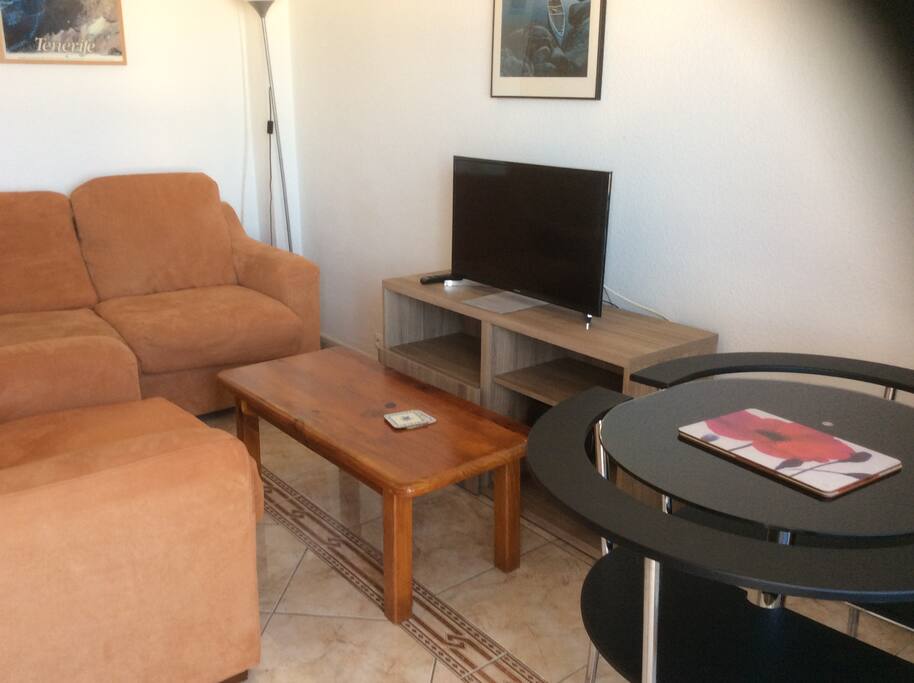 Dining table with pullout chairs