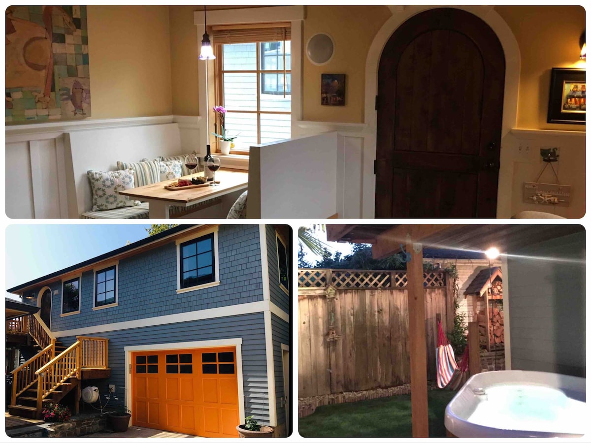 An inviting dining nook features a cozy seating arrangement with large windows allowing natural light. The exterior showcases a charming house with a vibrant orange garage door. A private backyard area is equipped with a hot tub, adjacent to a wooden fence and a hammock.