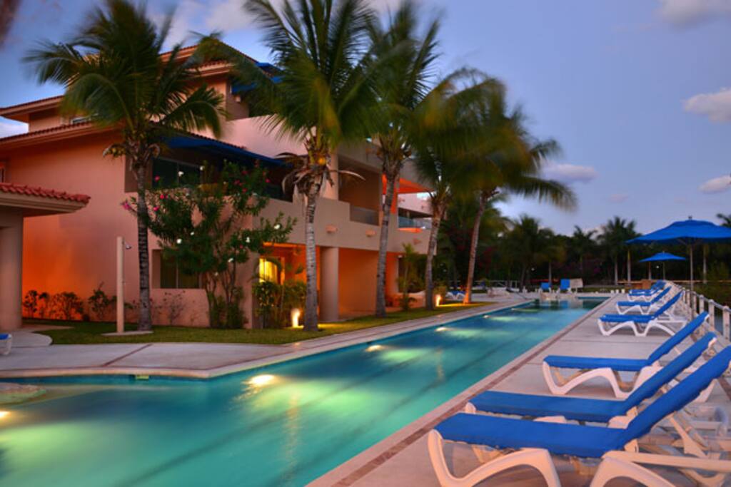Pool chairs and barbecue area