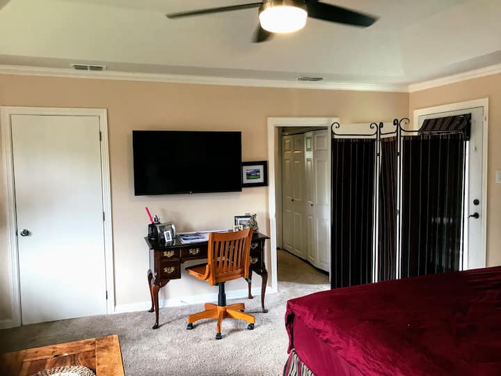 master bedroom with HD TV