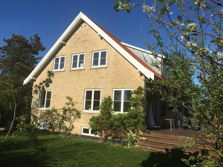 Picture of the house front. 3 windows on 1st floor are the Master Bedroom