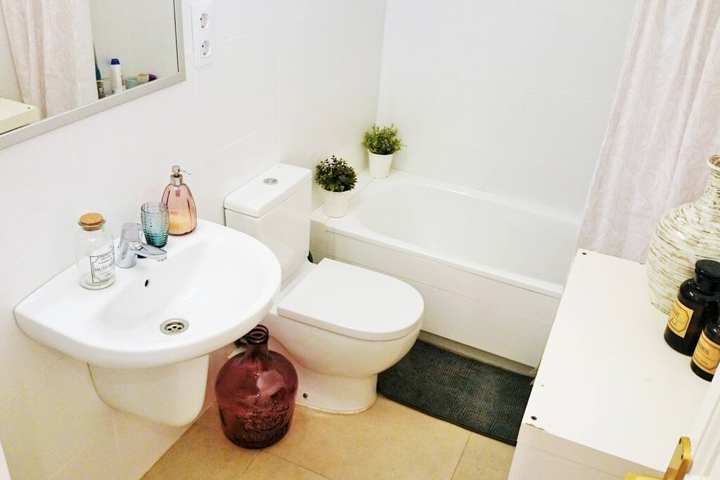 Full size bathroom with Shower and bath.
