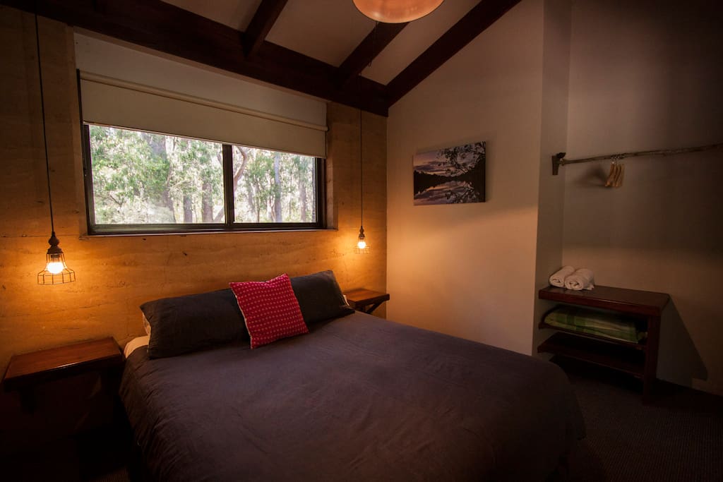 Our two bedrooms have comfy queen beds and room to hang your clothes too.