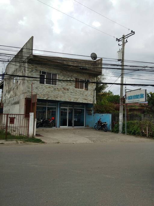 Apartment building. Located by the main road.