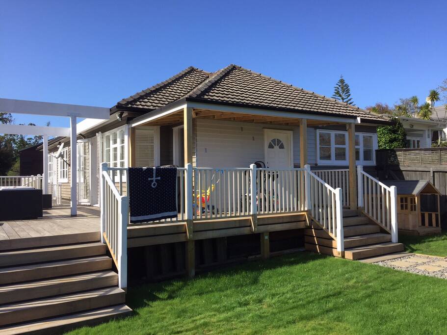 The property is fully fenced with lawn at the front and garage access at the rear.