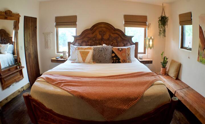 Bedside benches for luggage.  Come and stay for a while at Casa Unico!!