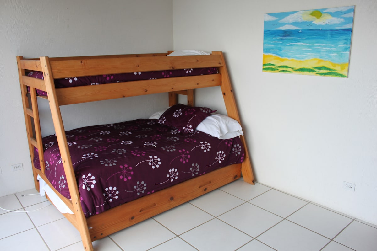 Front Bedroom with double lower bunk, twin upper bunk and lower twin trundle