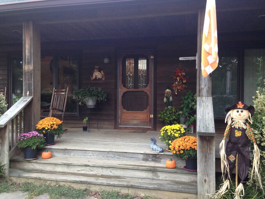 Front porch w/two rockers and swing.