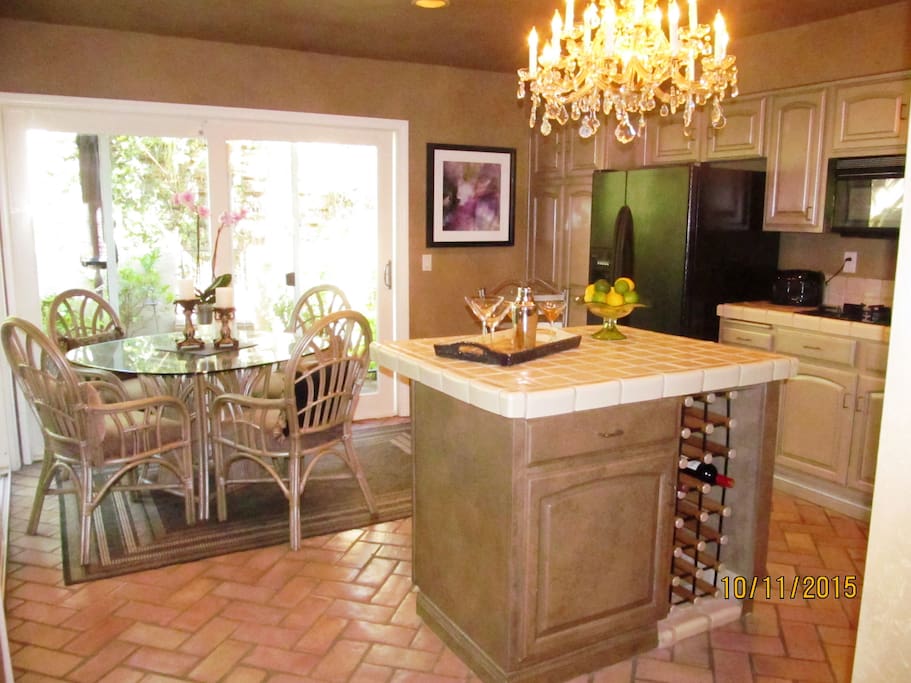 With wine storage in the island and breakfast nook by the patio.