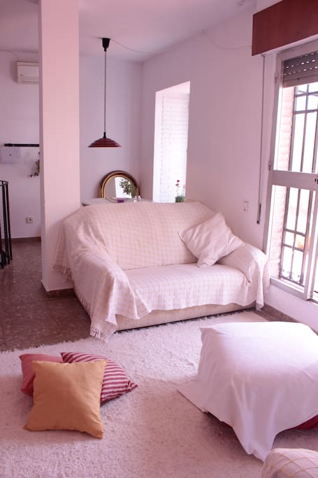 Relax on the couch after a long day trekking the city.