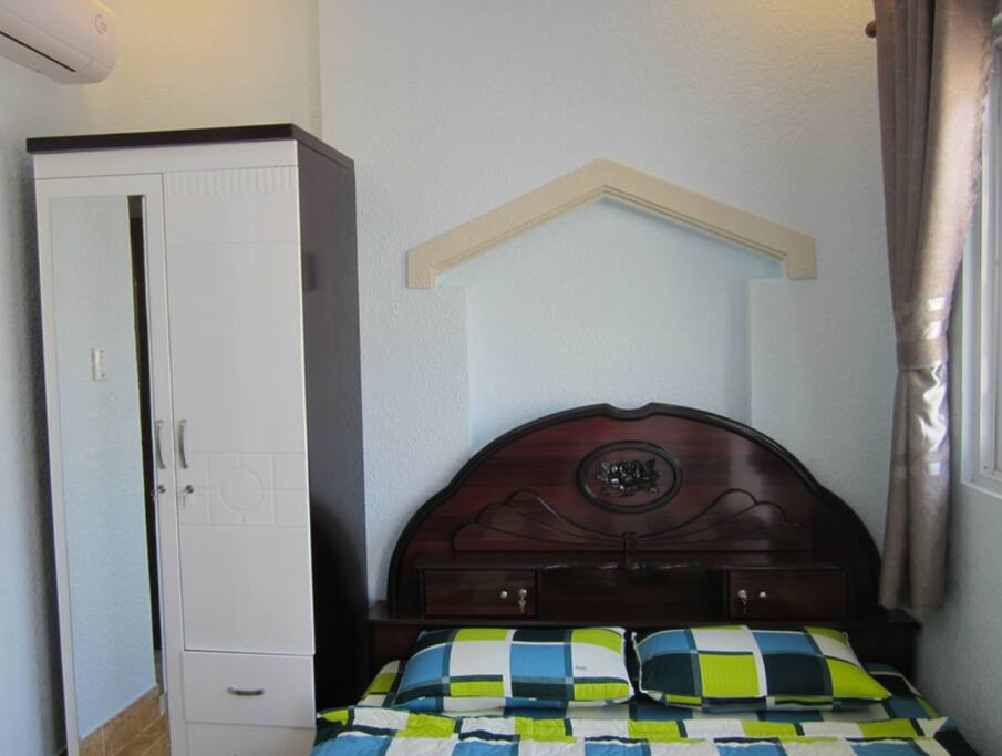 Room 302 - Location 4 (w/ Private bathroom and next to the roof terrace) - this location is in a local day-market alley
