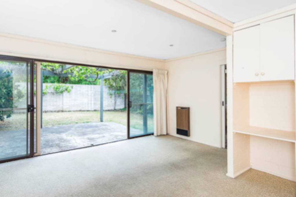 Floor to be replaced and room to be furnished. Private rear courtyard with gas BBQ