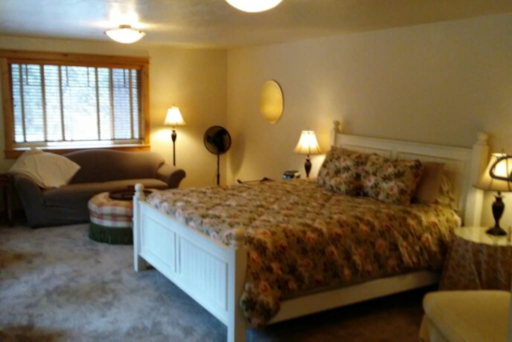 Your guest Suite with Cal King Bed and sitting area.