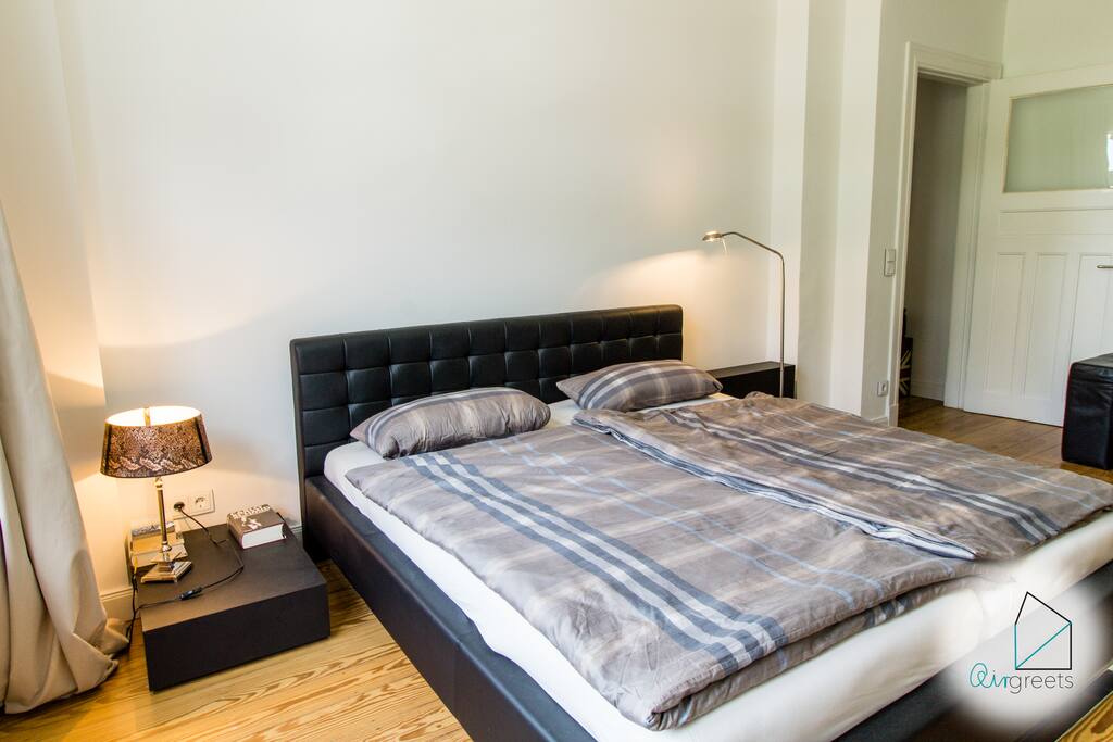 The bedroom is modern and high-quality.