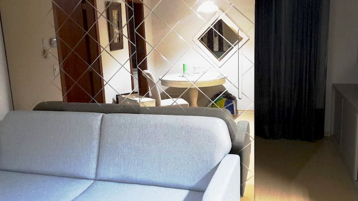 Sofá cama adicional en el dormitorio