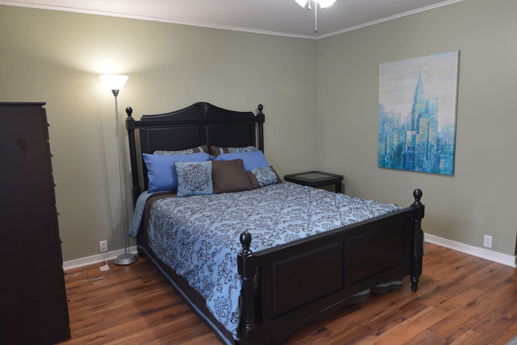 Large master bedroom with queen bed.