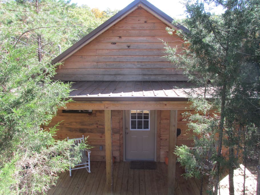 Front of the cabin. It is secluded in the pine woods for all the privacy you want.