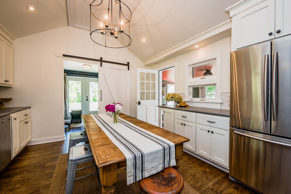 The spacious & immaculate kitchen. Like the rest of the house, it's a mix of vintage finds and top-of-the-line modern amenities.