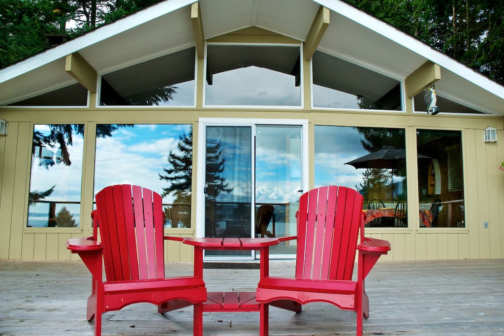 Large spacious sun filled deck. Propane BBQ and patio dining.