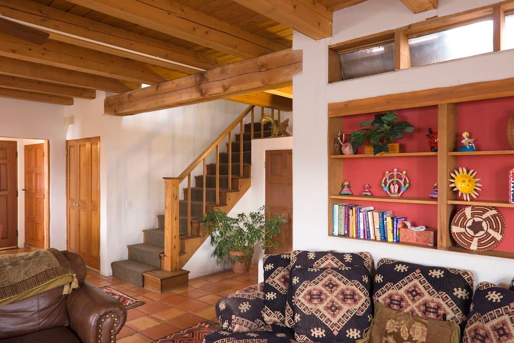 Ascend a flight of stairs for the bathroom and both bedrooms.