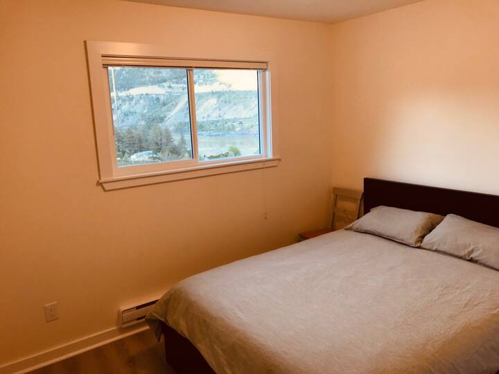 Bedroom with a view of Fraser River and the Fountain mountain ridge