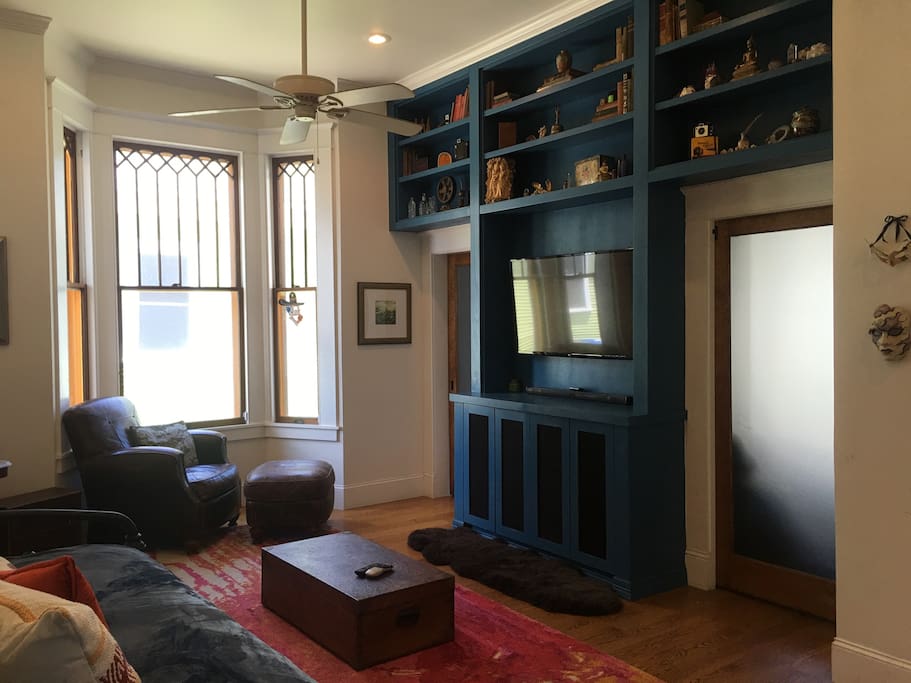 living room ( behind the doors is the library/bedroom with the sofa bed)