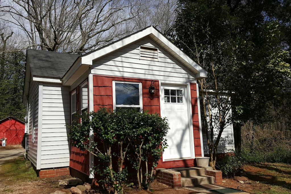 Adorable bungalow on a very quiet street, with rear parking and pretty barn.