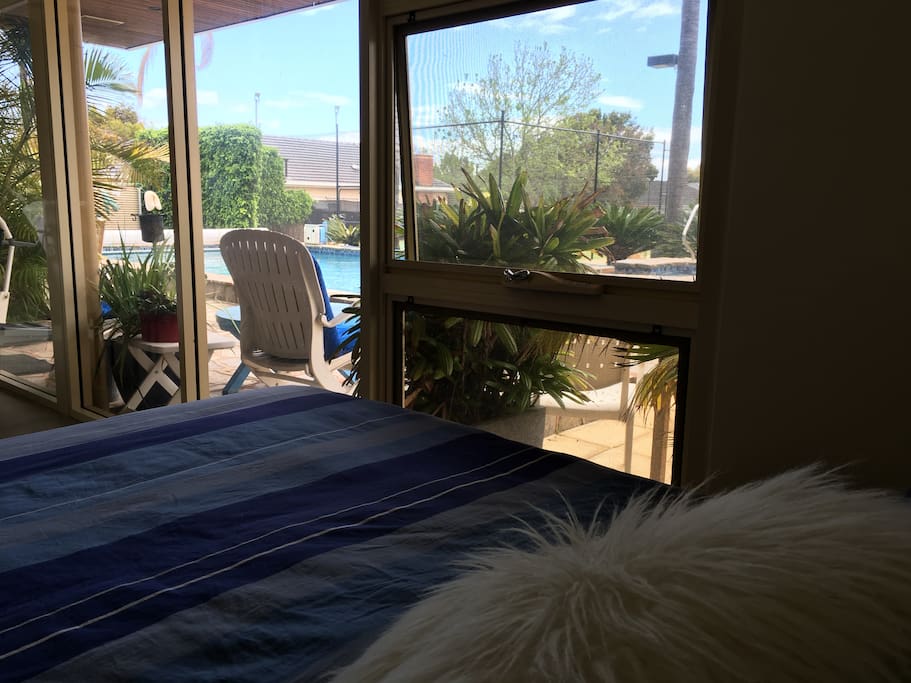 Bed room view to the outside pool area