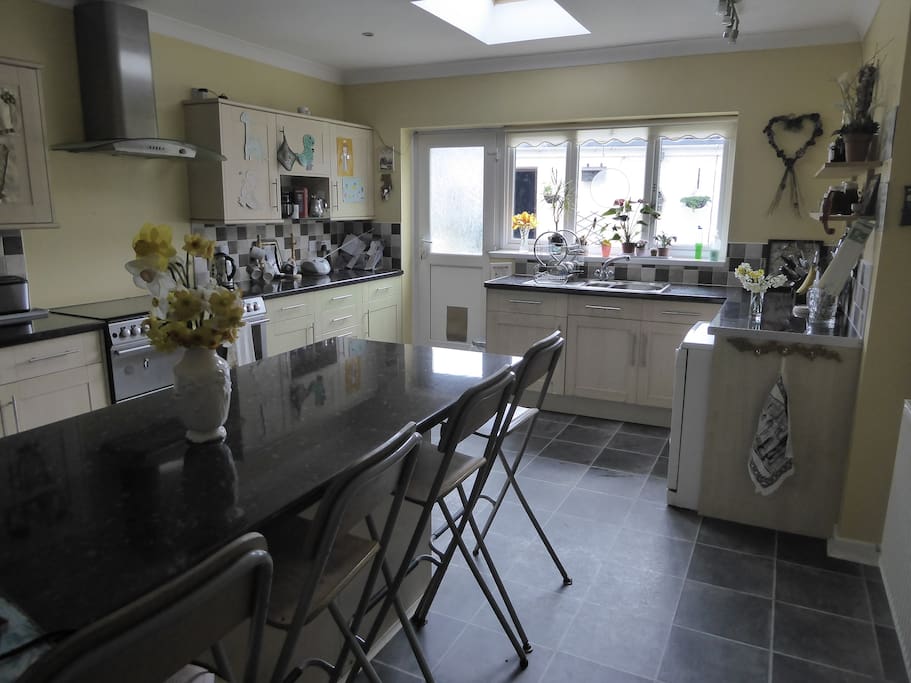 Large kitchen with breakfast bar