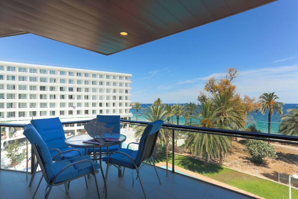 Terrace with outdoor dining and sea views