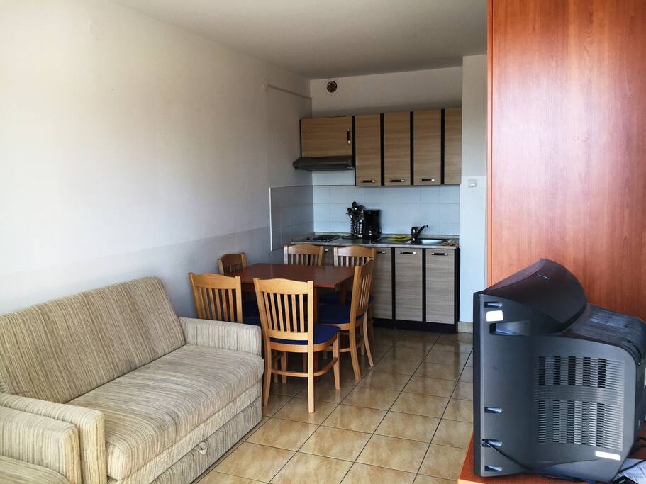 Living room with dining area and the kitchen