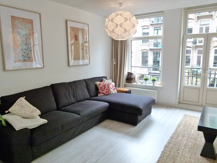 Big living room with street view.