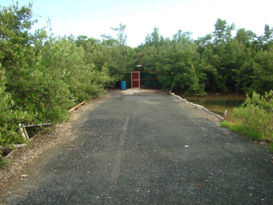 Entrance and parking to the house