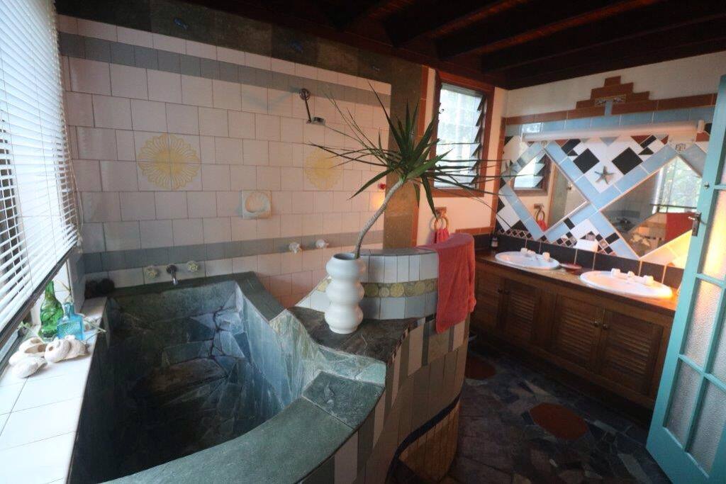 Huge and unique bathroom complete with Japanese-style bath tub, very deep!