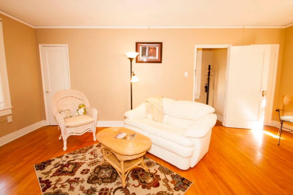 Airy living area, leather sofa.