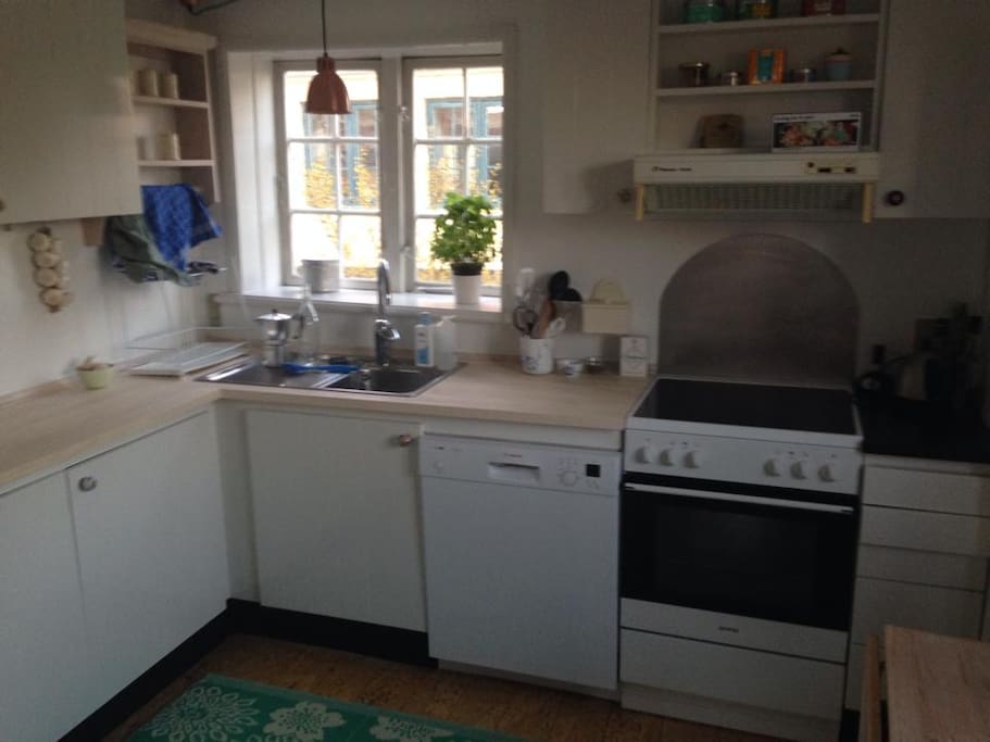 The kitchen. A baby chair has later been added.