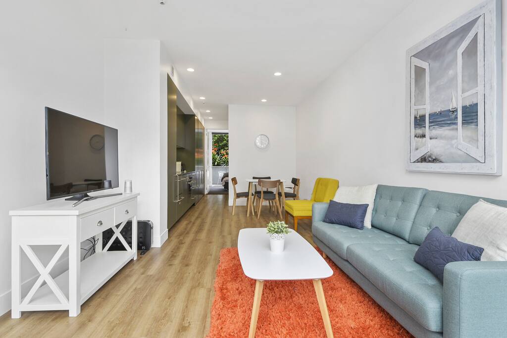 Open plan lounge, dining and kitchen.