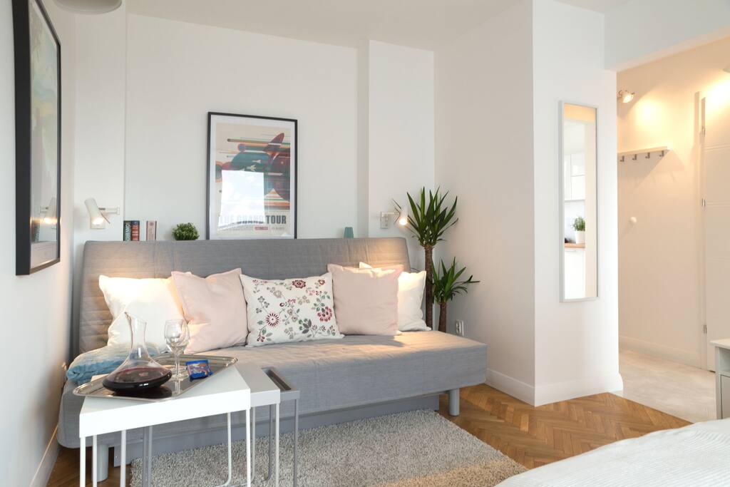 Convertible sofa with sleeping option for 2 people.