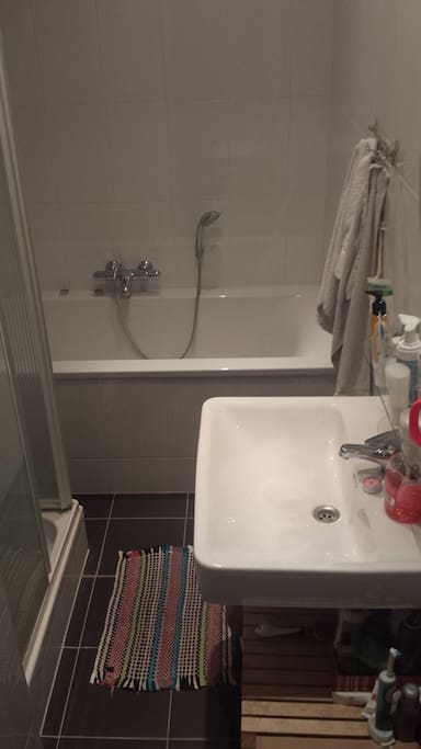 Bathroom with shower and bath