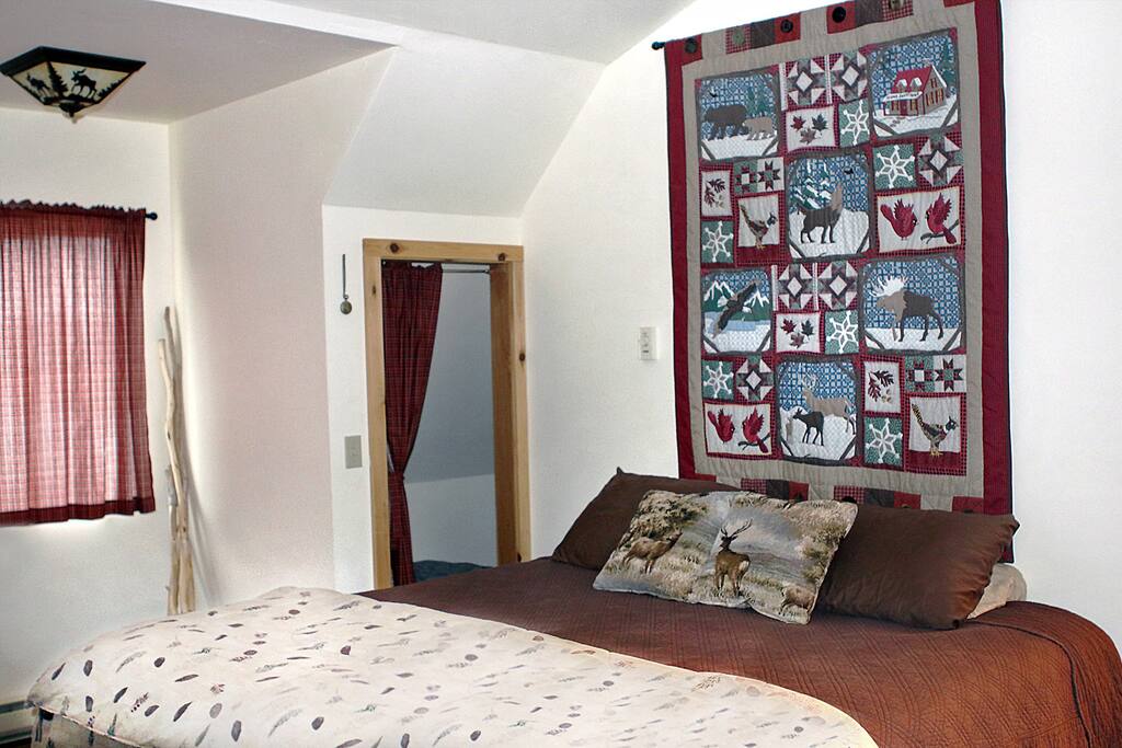 Queen mattress and full size sofa bed. Suited for 2 adults and 2 children.