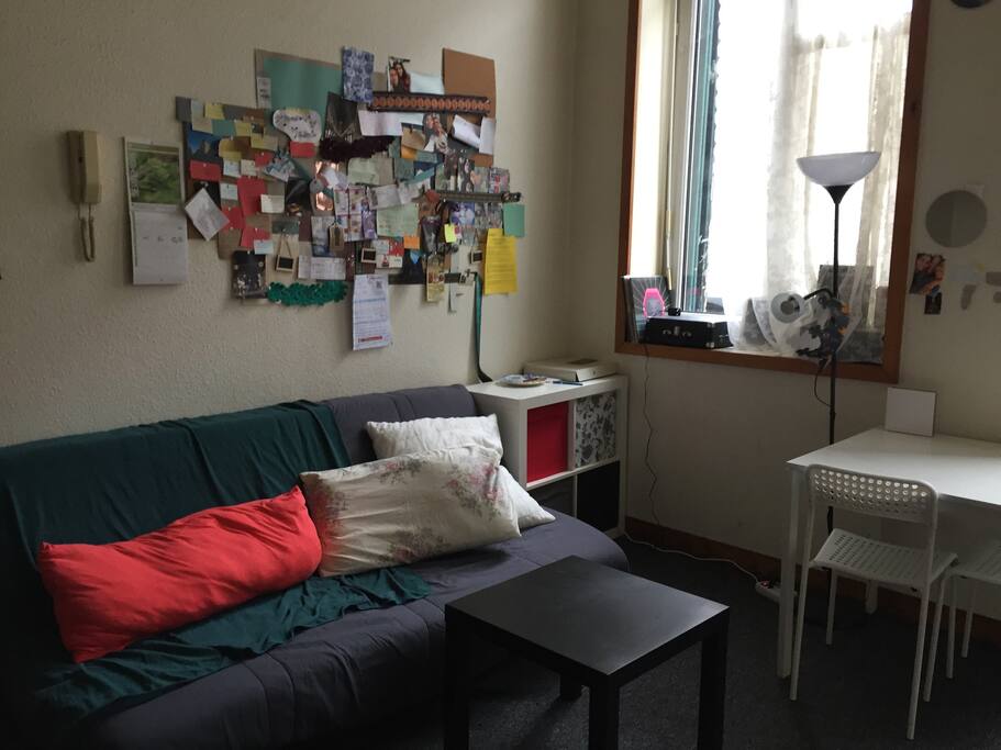 This is the sofa bed and the downstairs area where you'll find everything you need, a table where you can eat and a small coffee table.