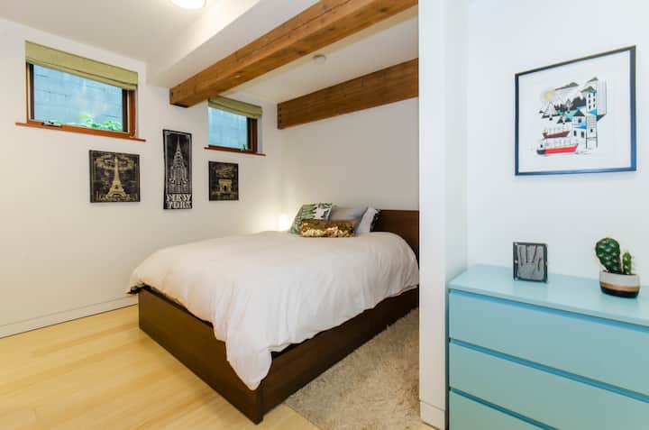 Second downstairs bedroom with queen bed.