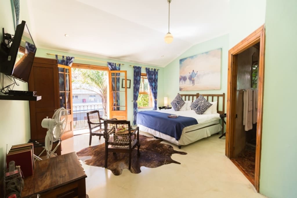 Bedroom with step-out balcony