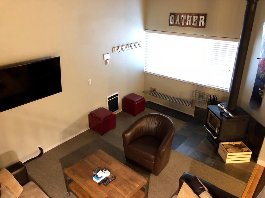 Living Room (55" UHD TV, Blu-Ray, , cable and WiFi) + wood burning stove & boot storage